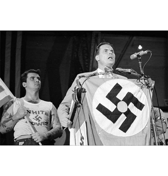 George Lincoln Rockwell speaks to the crowd at his September 1966 “White People’s March" at the Chicago Coliseum. (Courtesy Chicago History Museum, ICHi-078056; Declan Haun, photographer)