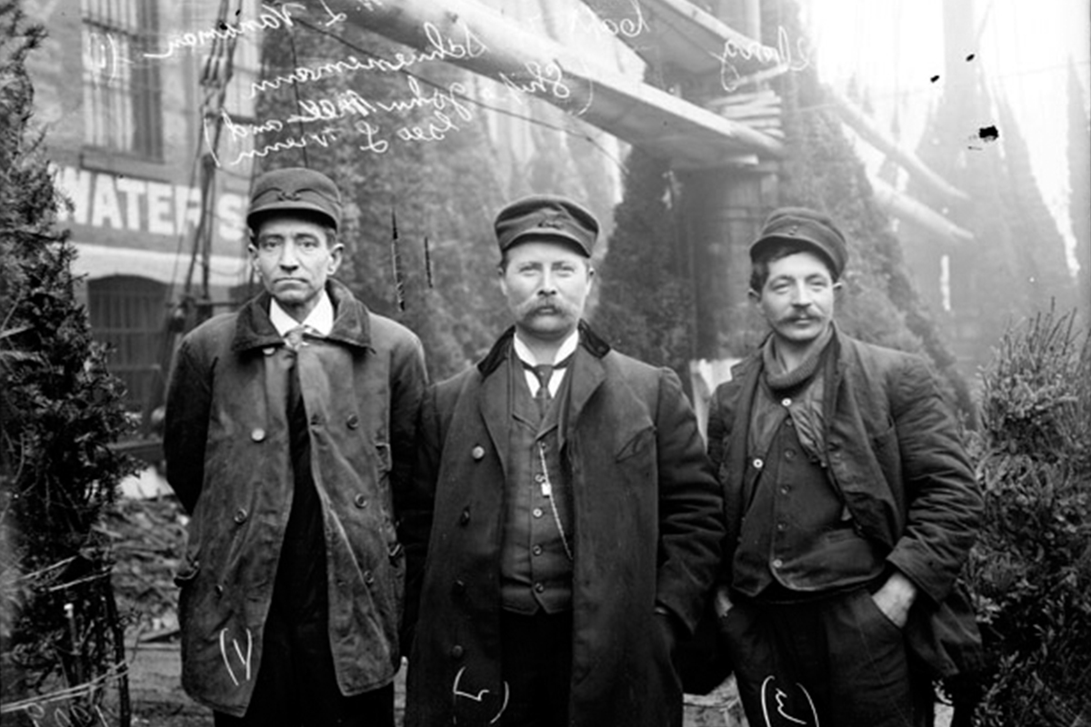 Captain Herman “Christmas Tree” Scheunemann, center was among the pioneers of the local Christmas tree trade. He perished in an accident when his tree-loaded ship went down in icy Lake Michigan storms. (Courtesy of Chicago History Museum, DN-0006926)