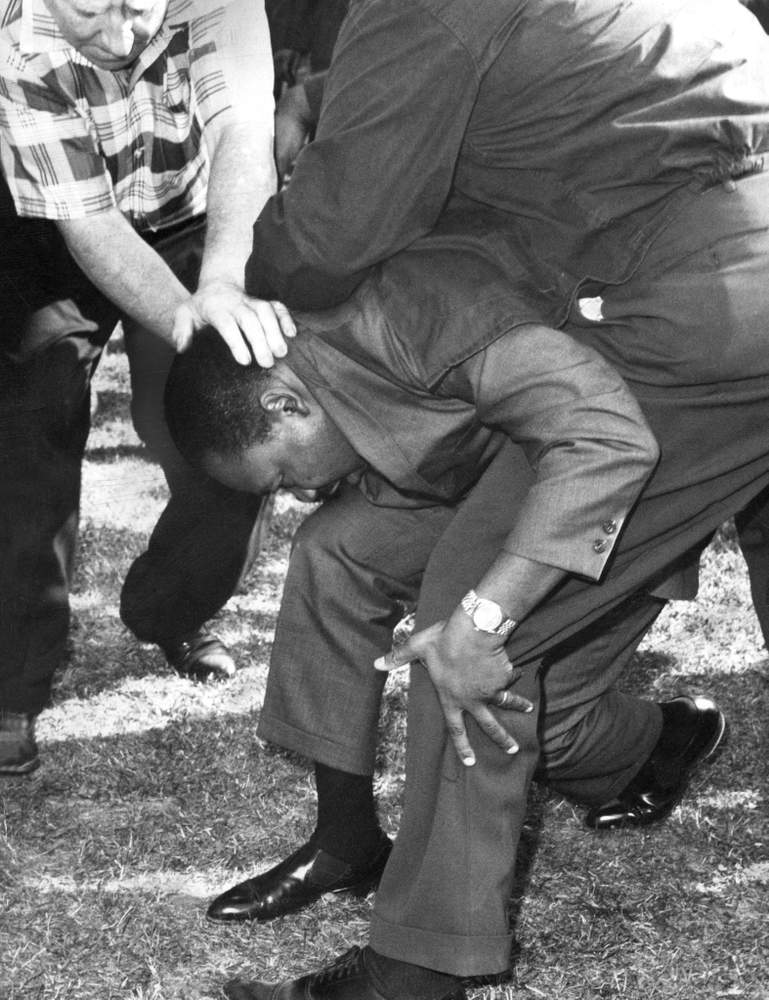 A counter-demonstrator threw an object that hit Martin Luther King Jr. in the head as he was marching in Marquette Park on August 5, 1966. (Courtesy Chicago Sun Times)