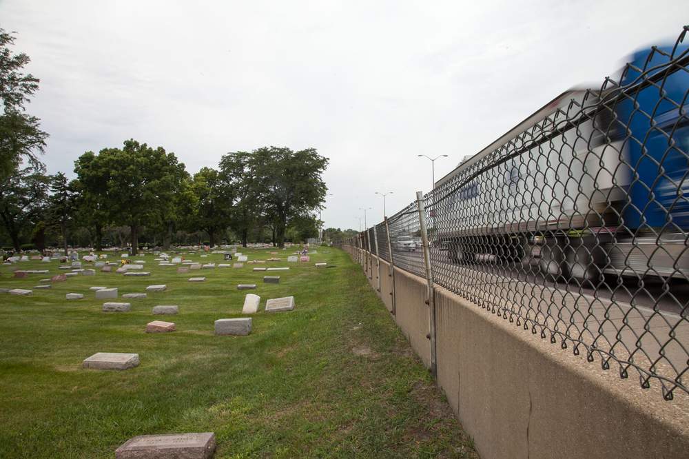 Thousands of graves had to be relocated at Forest Home Cemetery to accommodate the construction of the Eisenhower Expressway. Today,  there&#39;s barely a buffer between where the cemetery ends and the highway begins. (Photo courtesy Alexis Ellers)