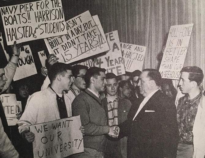 University of Illinois students congratulate Mayor Daley on the Harrison-Halsted site decision. (Courtesy of Chicago Sun Times)